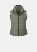 ALAN PAINE - LADIES DIDSMERE TECHNICAL TWEED VEST Denne stilfulde Didsmere damevest er en fantastisk måde at holde sig varm på, mens den stadig ser skarp ud. Skåret af slidstærkt, 100 % polyesterstof og trimmet med en imiteret læderbinding, giver den en normal pasform for komfort.  100% polyester Foret med en lang luv, luksuriøst imiteret pelsfor Welt brystlommer med mikrofleecefor Sikker intern lomme letvægts temperaturregulerende fyld To lynlåssikrede håndvarmerlommer Maskinvaskbar